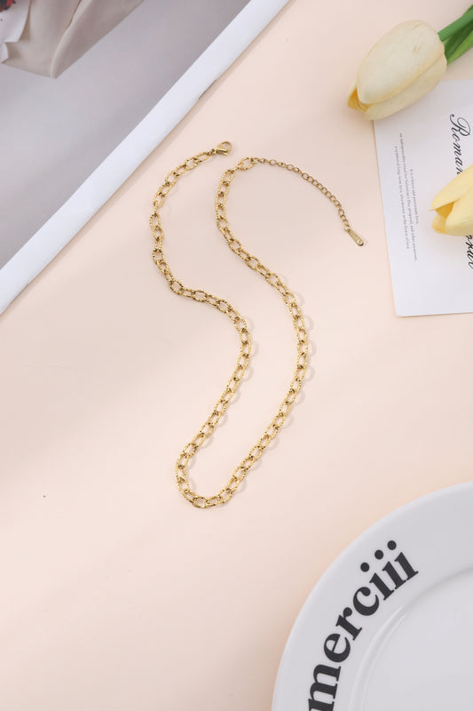 Collier chaîne dorée maillons ovales martelés effet brillant