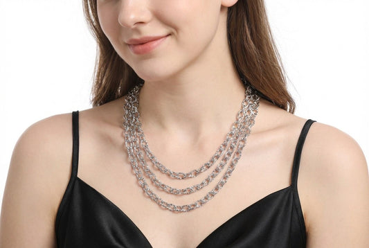 Collier triple chaînes dorées striées