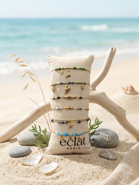 Lot de 6 bracelets dorés thème mer sur coussin