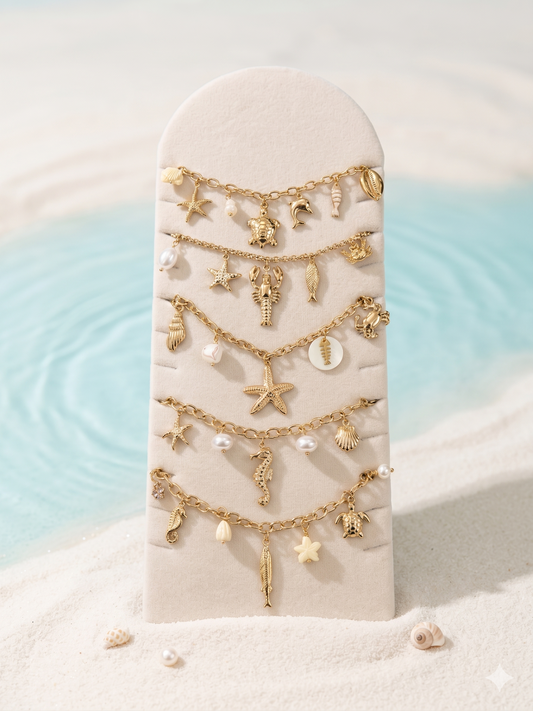 Lot de 5 bijoux à pendentifs marins