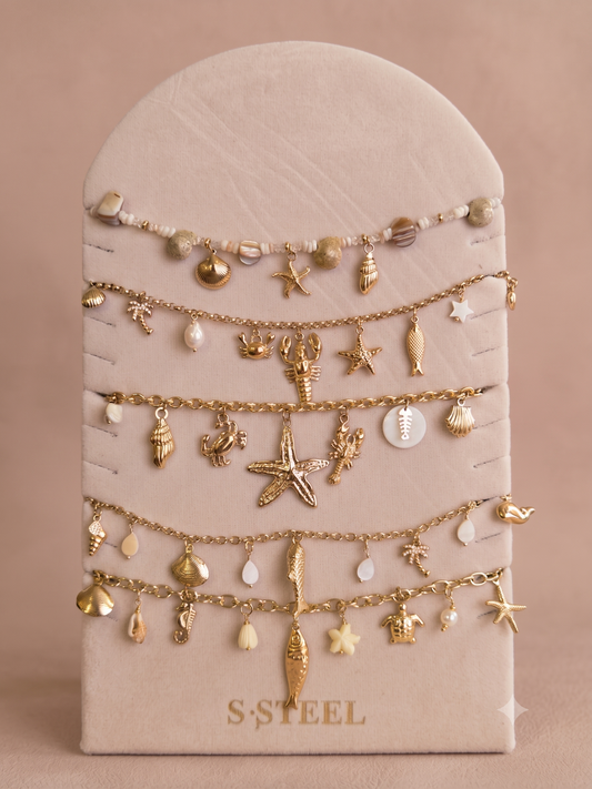 Lot de 5 bijoux à pendentifs marins