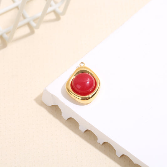 Lot de 3 pendentifs dorés cabochon rouge