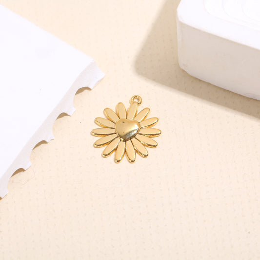 Lot de 3 pendentifs dorés fleur avec cœur central