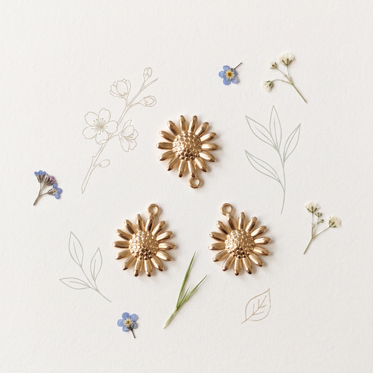 Lot de 3 pendentifs dorés marguerites
