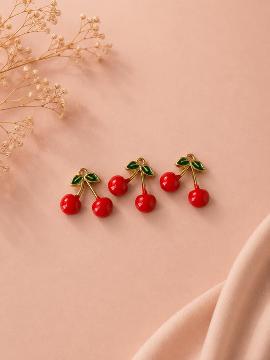 Lot de 3 pendentifs dorés cerises rouges émaillées