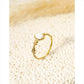 Golden ring with pink stone