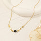 Collier losange et perles de couleur