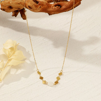 Collier losange et perles de couleur