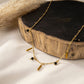 Necklace with pendants and green beads