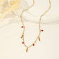 Necklace with pendants and green beads