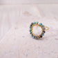 Circle ring surrounded by white pearls