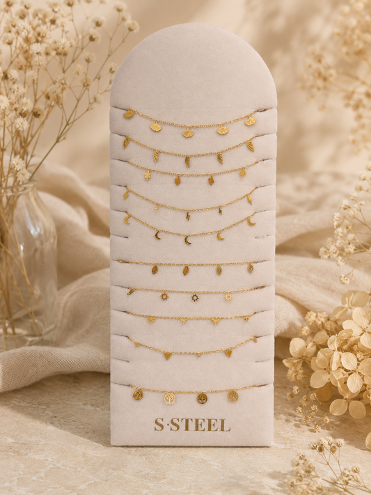 Lot de 10 chaînes de chevilles maillons fins dorés avec pampilles variés (fleurs, ailes, feuilles…)