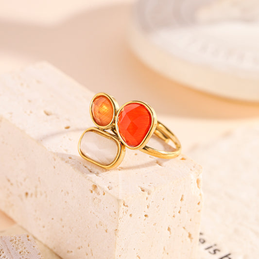 Bague dorée pierres orange, nacrée et beige