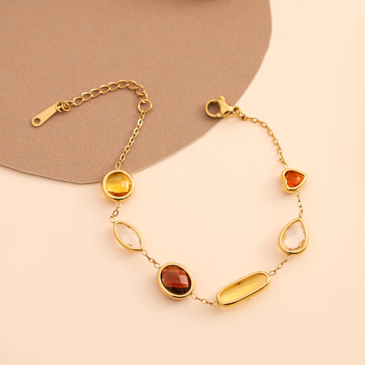 Bracelet strass marron et jaunes formes variées