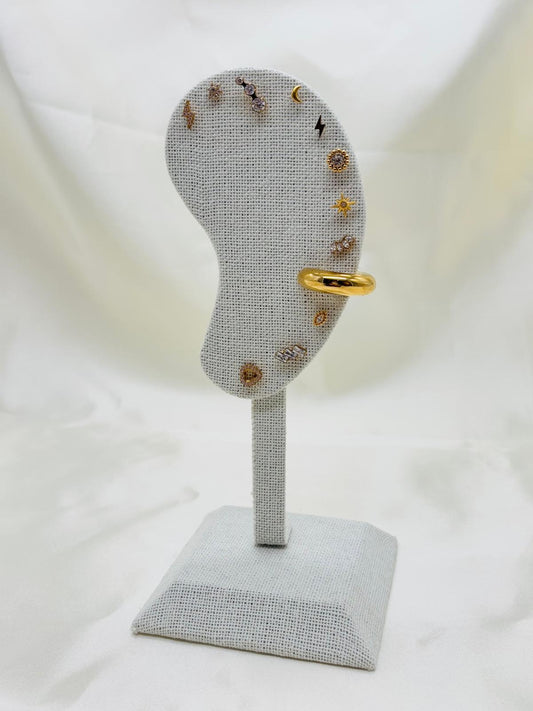 Présentoir en forme d'oreille pour boucles d'oreilles