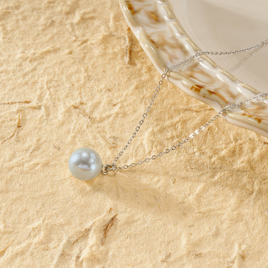 Collier argenté chaîne fine pendentif perle grise sphère