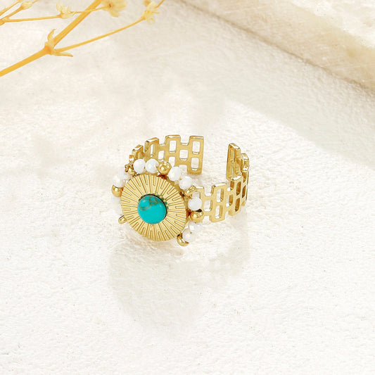 Bague Dorée Ajustable Soleil Avec Pierre Turquoise Et Perles Blanches - Eclat Paris
