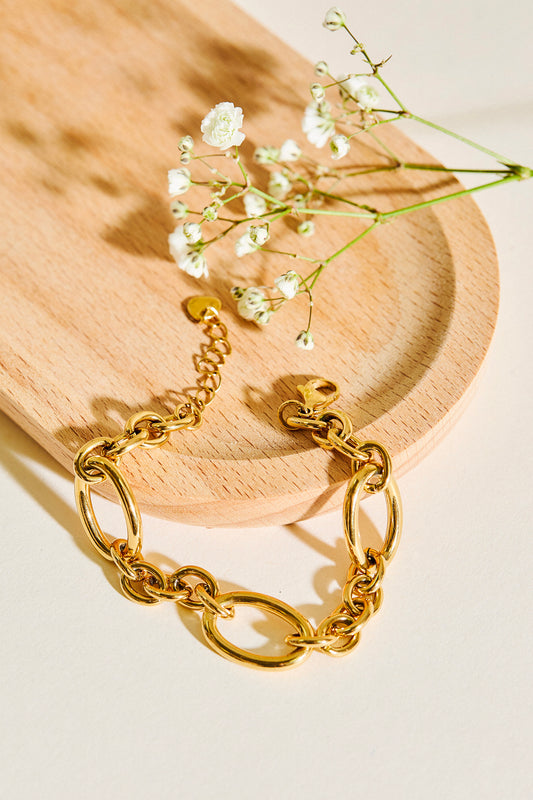 Bracelet Doré Avec Trois Large Maillons Séparés