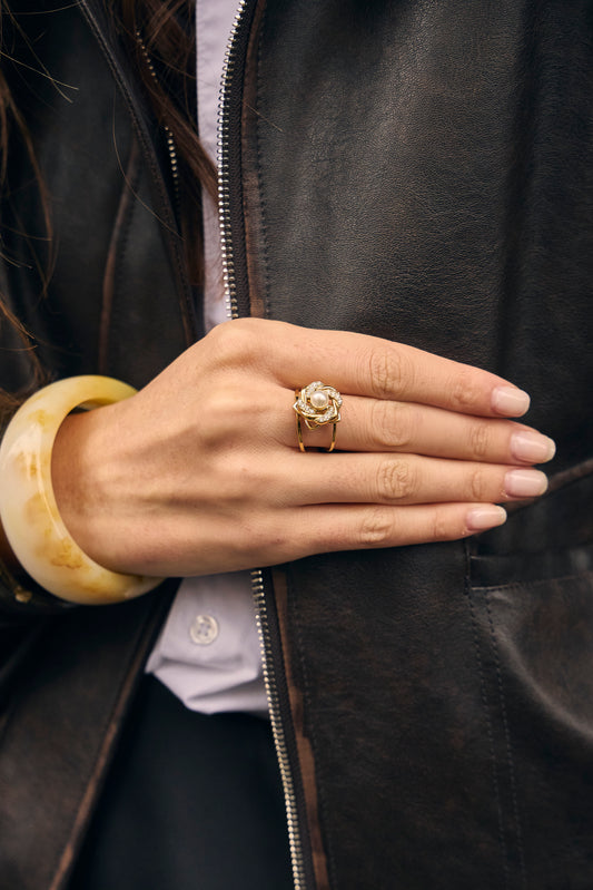 Bague dorée ajustable anti stress perle centrale fleur tournante