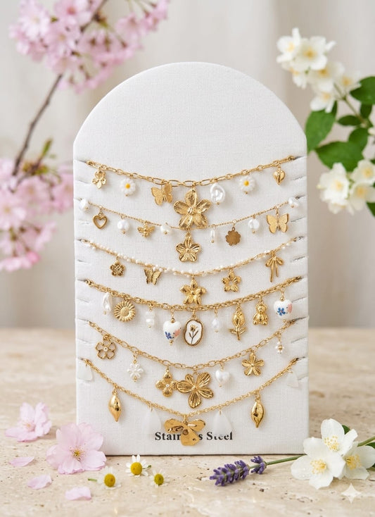Lot de 6 bracelets et colliers thème fleurs blanches