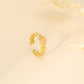 Ring with leaf outline pink stone