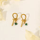 Knot and green pearl earrings