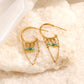 Circle earrings with green pearls and chain
