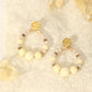 Hammered round earrings and white pearls