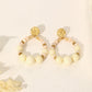 Hammered round earrings and white pearls