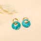 Boucles d'oreilles créoles avec pierre