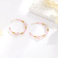 Boucles d'oreilles créoles et perles vertes
