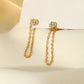 Rhinestone earrings with dangling chain