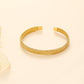Braided bangle bracelet