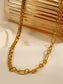 Asymmetrical chain necklace with clasp