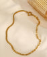 Asymmetrical chain necklace with clasp