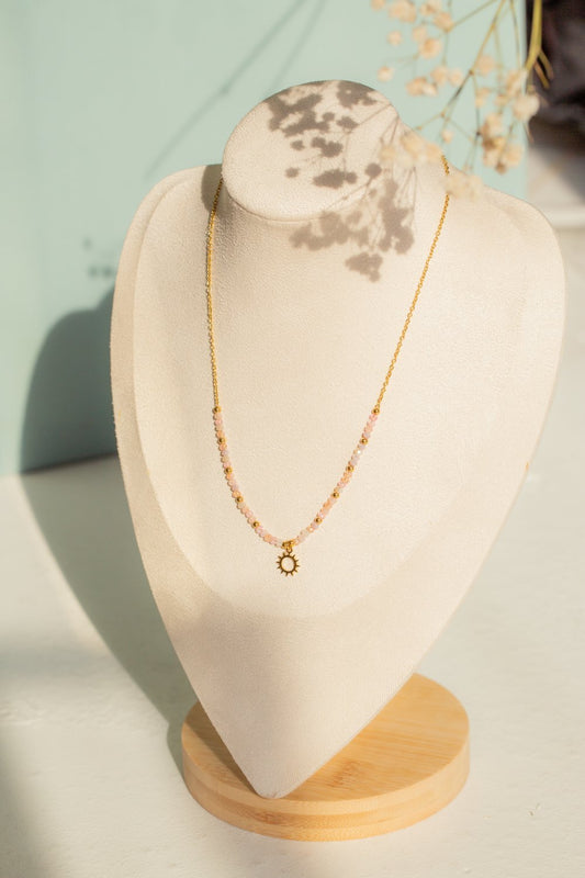 Collier perle avec pendentif soleil