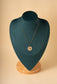 Chain necklace with round and sun pendants
