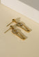 Golden pin earrings with rhinestones