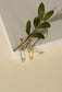 Golden pin earrings with rhinestones