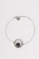 Silver bracelet with black pendant