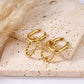 Crossed circle earrings