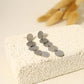 Golden earrings with 5 dangling pellets