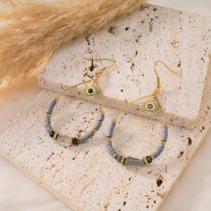 Boucle d'oreilles gouttes soleil