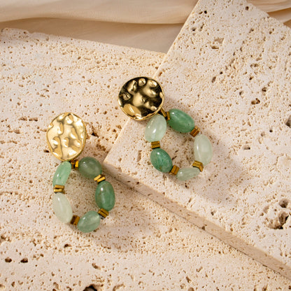 Earring with green stones