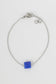 Silver bracelet with blue stone