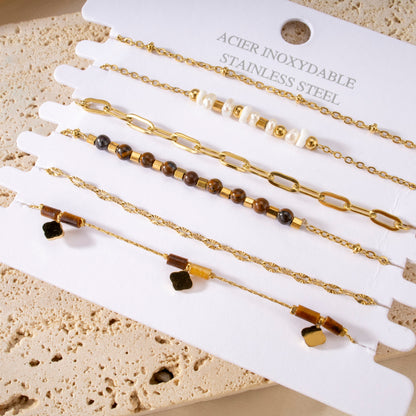 Multiple brown diamond bracelets