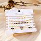 Bracelets multiples noirs losange