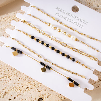 Bracelets multiples noirs losange