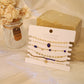 Multiple navy bracelets with stones