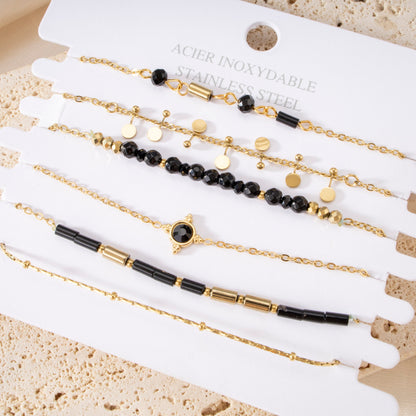 Multiple bracelets black with pearls